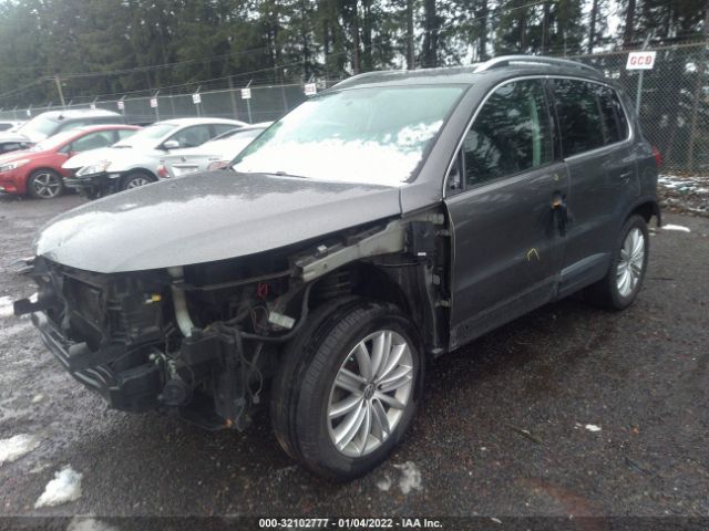 Photo 1 VIN: WVGAV3AX4EW043677 - VOLKSWAGEN TIGUAN 