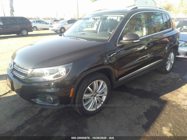 Photo 1 VIN: WVGAV3AX6EW593947 - VOLKSWAGEN TIGUAN 