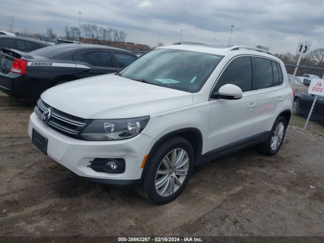 Photo 1 VIN: WVGAV3AX8DW071142 - VOLKSWAGEN TIGUAN 