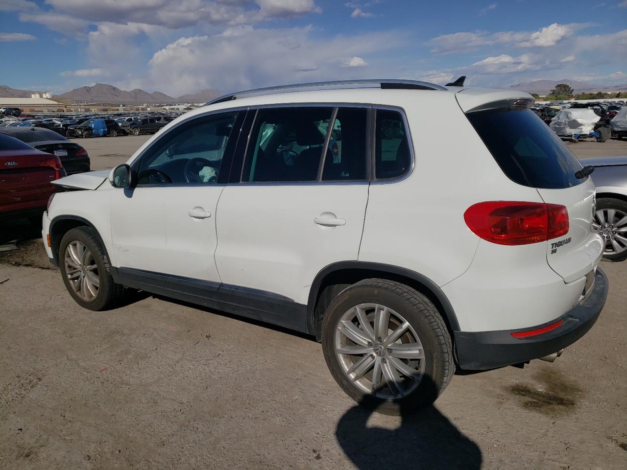 Photo 1 VIN: WVGAV7AX0GW597681 - VOLKSWAGEN TIGUAN 