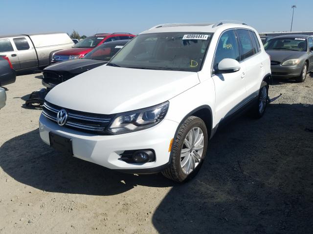 Photo 1 VIN: WVGAV7AX1GW031304 - VOLKSWAGEN TIGUAN S 