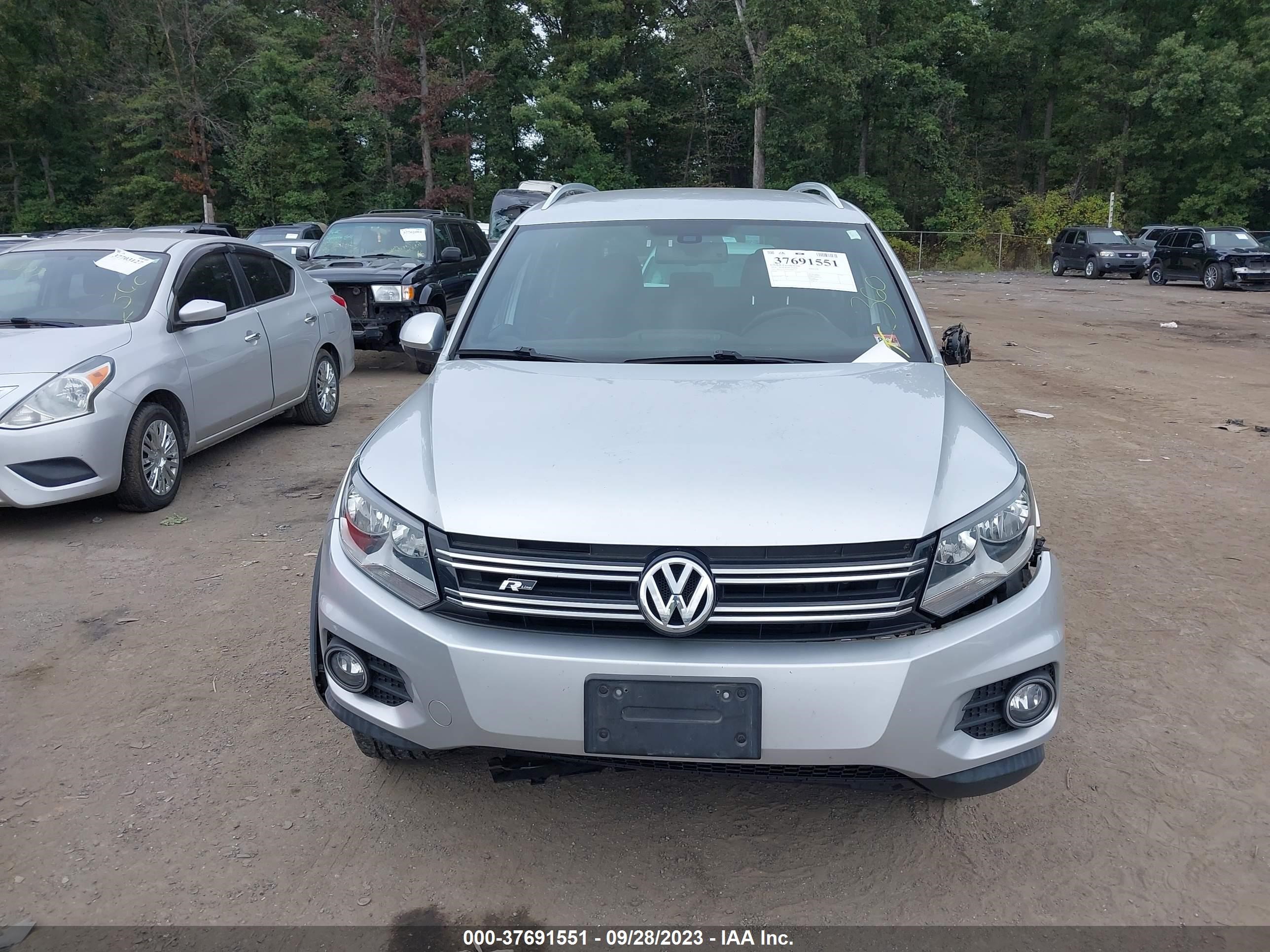 Photo 11 VIN: WVGAV7AX2GW085193 - VOLKSWAGEN TIGUAN 