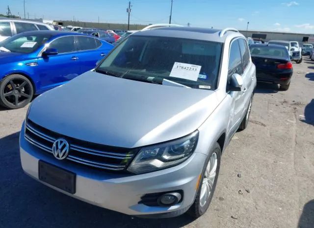 Photo 1 VIN: WVGAV7AX2GW560373 - VOLKSWAGEN TIGUAN 