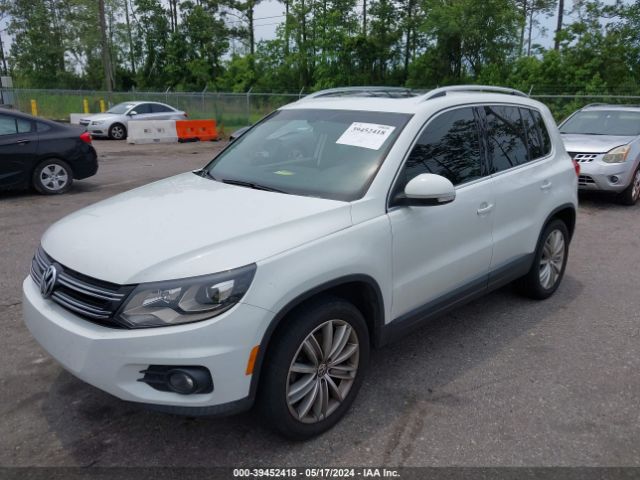 Photo 1 VIN: WVGAV7AX2GW563015 - VOLKSWAGEN TIGUAN 