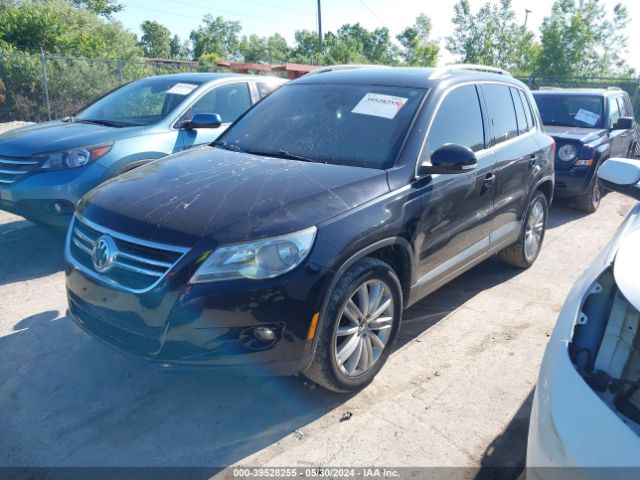 Photo 1 VIN: WVGAV7AX4BW524595 - VOLKSWAGEN TIGUAN 