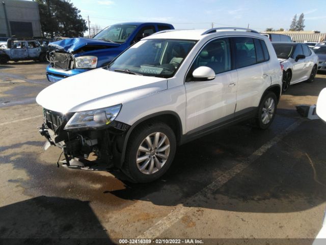 Photo 1 VIN: WVGAV7AX4BW525570 - VOLKSWAGEN TIGUAN 