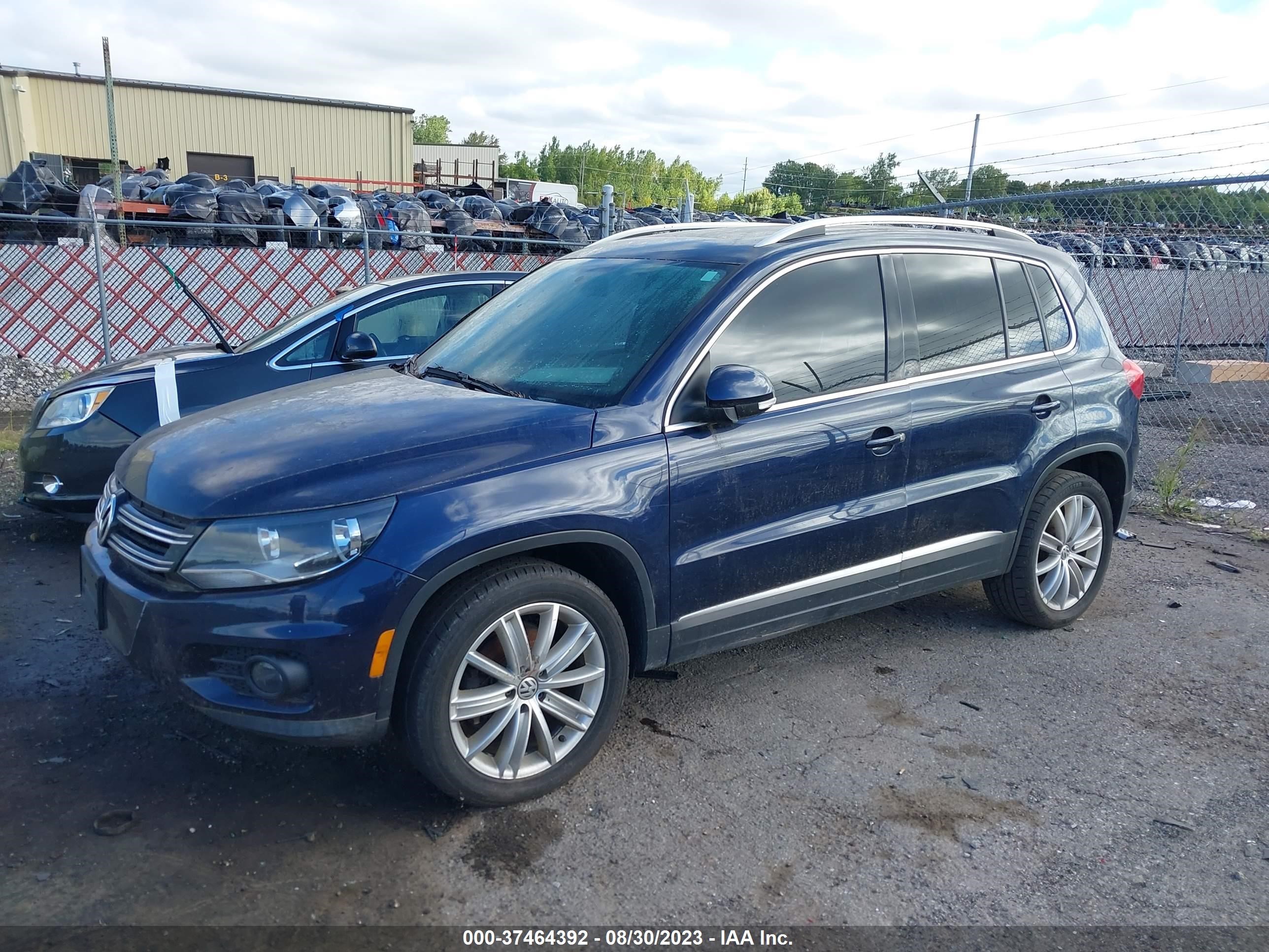 Photo 1 VIN: WVGAV7AX4DW502728 - VOLKSWAGEN TIGUAN 