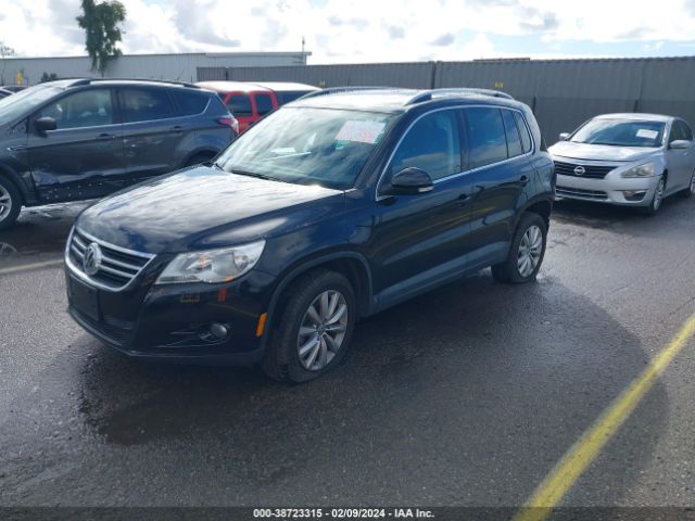 Photo 1 VIN: WVGAV7AX7BW556957 - VOLKSWAGEN TIGUAN 