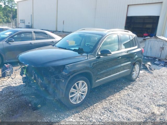 Photo 1 VIN: WVGAV7AX7GW523786 - VOLKSWAGEN TIGUAN 