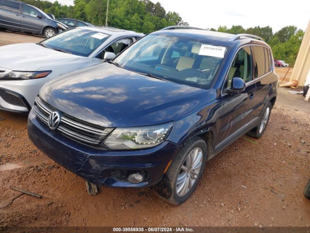 Photo 1 VIN: WVGAV7AX8GW565125 - VOLKSWAGEN TIGUAN 