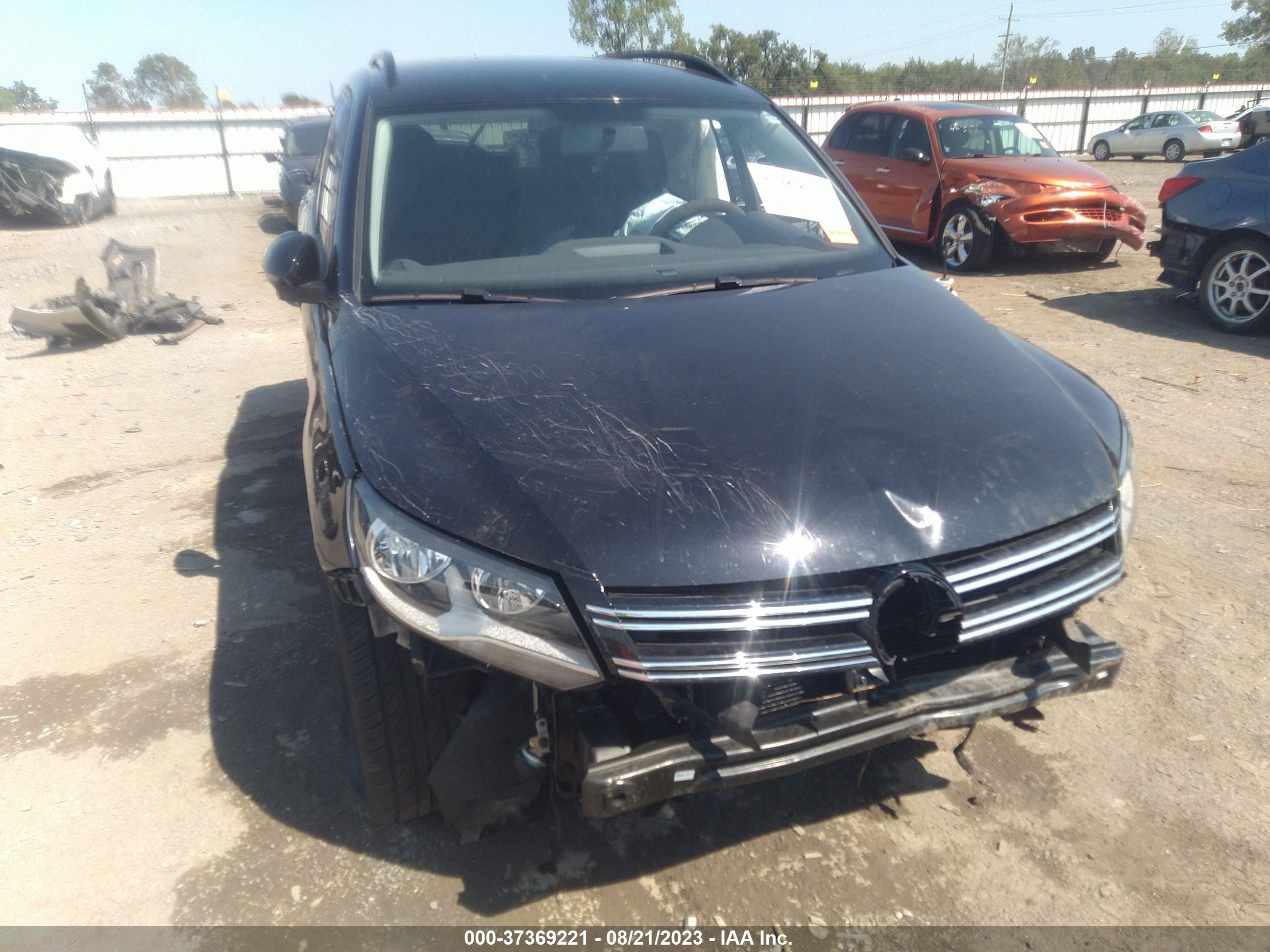 Photo 11 VIN: WVGAV7AX8HK044401 - VOLKSWAGEN TIGUAN 