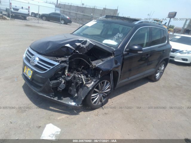 Photo 1 VIN: WVGAV7AXXBW548187 - VOLKSWAGEN TIGUAN 