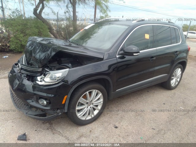 Photo 1 VIN: WVGAV7AXXGW554403 - VOLKSWAGEN TIGUAN 