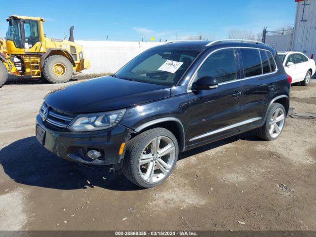 Photo 1 VIN: WVGBV3AX1EW084384 - VOLKSWAGEN TIGUAN 