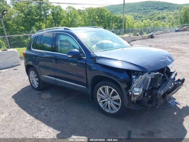 Photo 0 VIN: WVGBV3AX1EW624736 - VOLKSWAGEN TIGUAN 