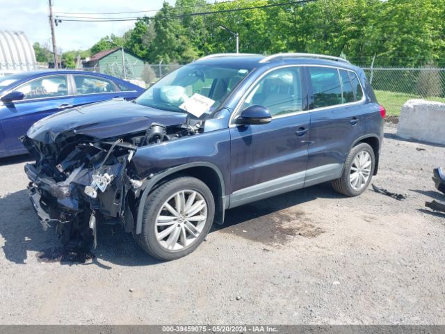 Photo 1 VIN: WVGBV3AX1EW624736 - VOLKSWAGEN TIGUAN 