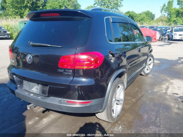 Photo 3 VIN: WVGBV3AX2EW097094 - VOLKSWAGEN TIGUAN 