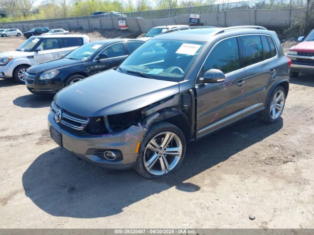 Photo 1 VIN: WVGBV3AX3EW101346 - VOLKSWAGEN TIGUAN 