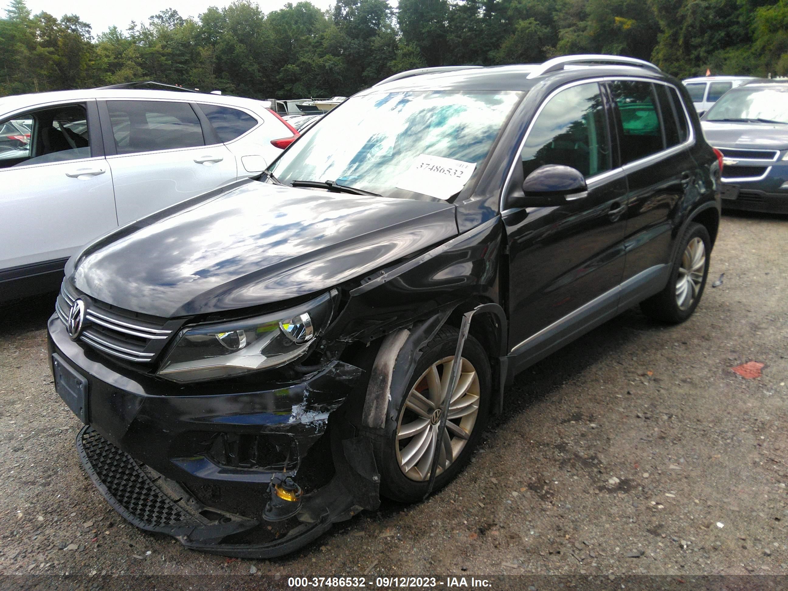 Photo 1 VIN: WVGBV3AX5EW583625 - VOLKSWAGEN TIGUAN 