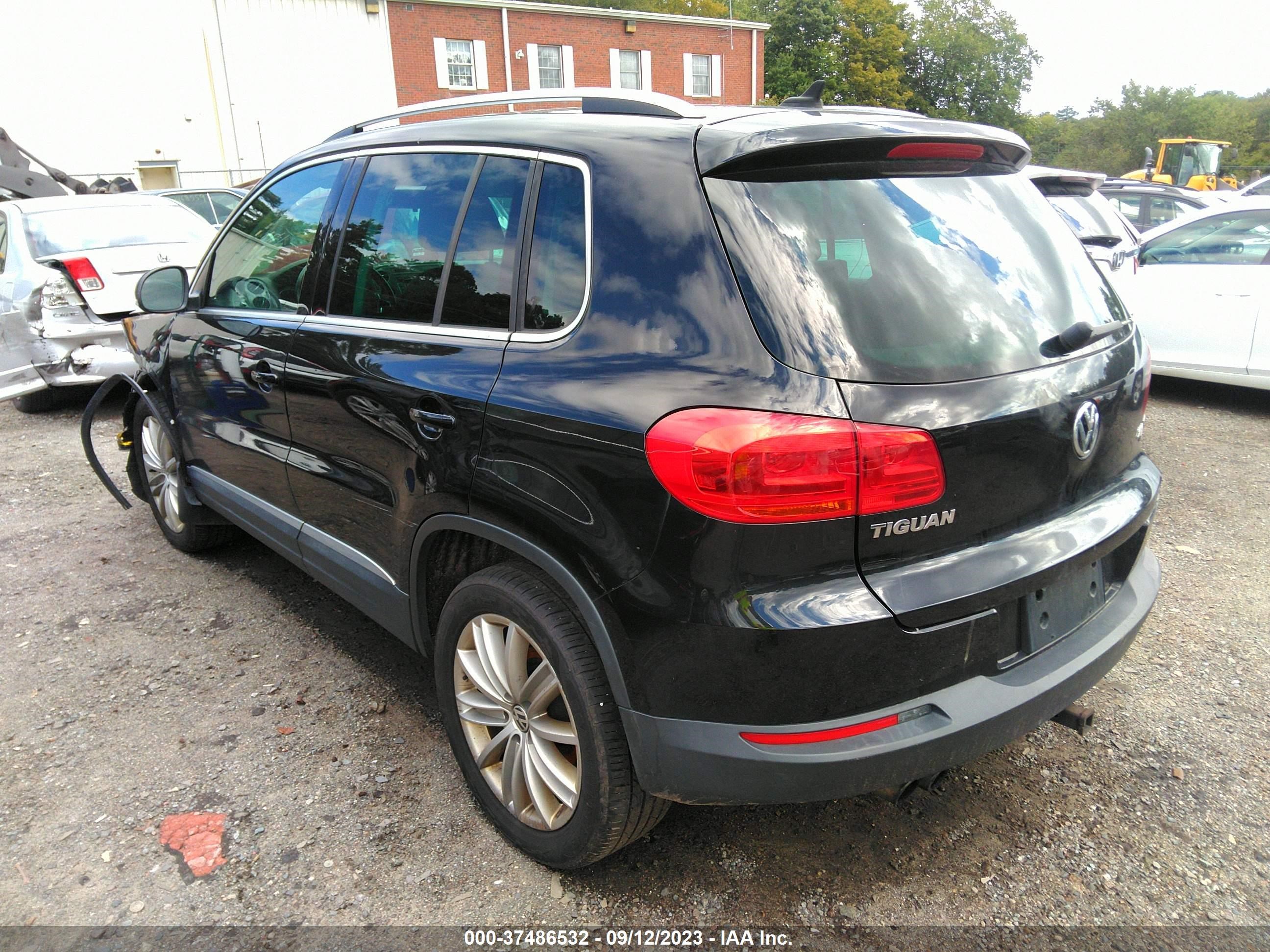 Photo 2 VIN: WVGBV3AX5EW583625 - VOLKSWAGEN TIGUAN 