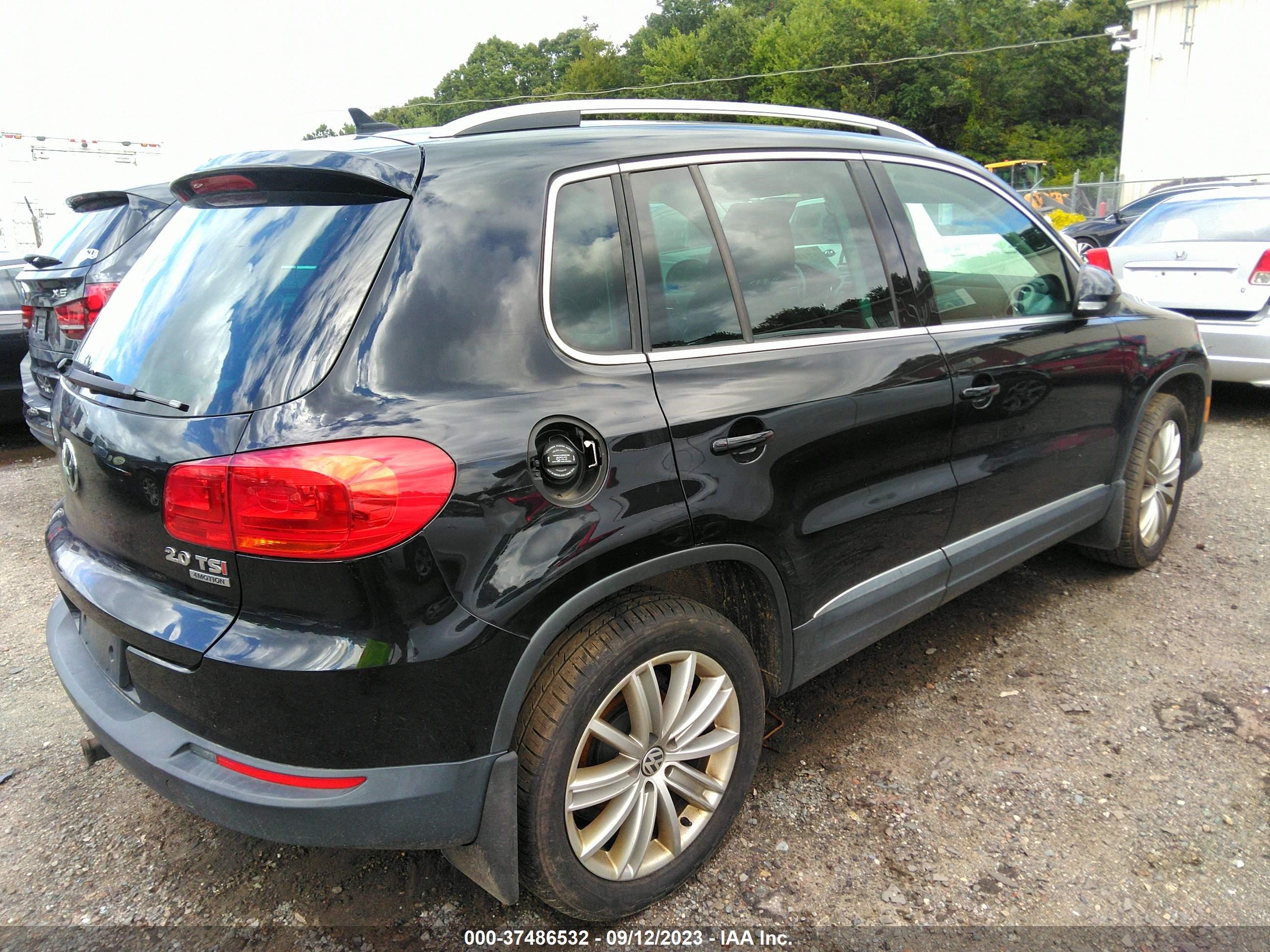 Photo 3 VIN: WVGBV3AX5EW583625 - VOLKSWAGEN TIGUAN 