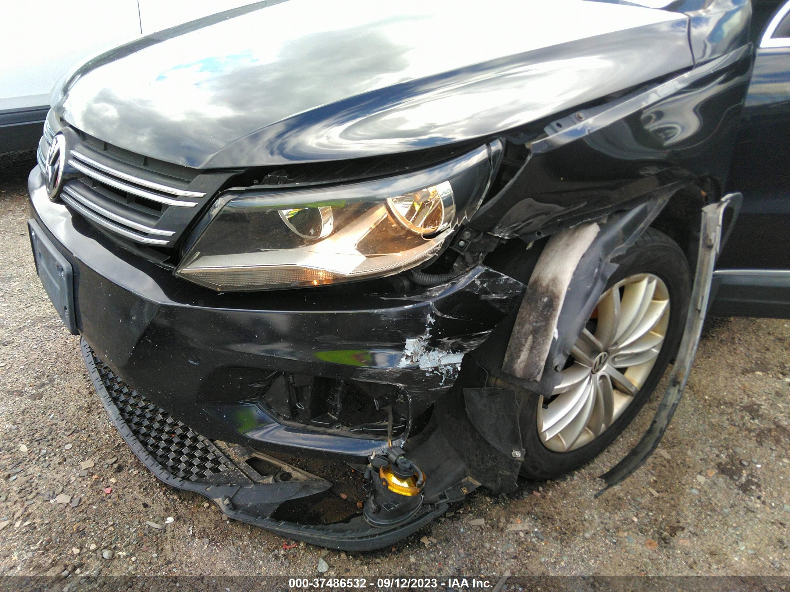 Photo 5 VIN: WVGBV3AX5EW583625 - VOLKSWAGEN TIGUAN 