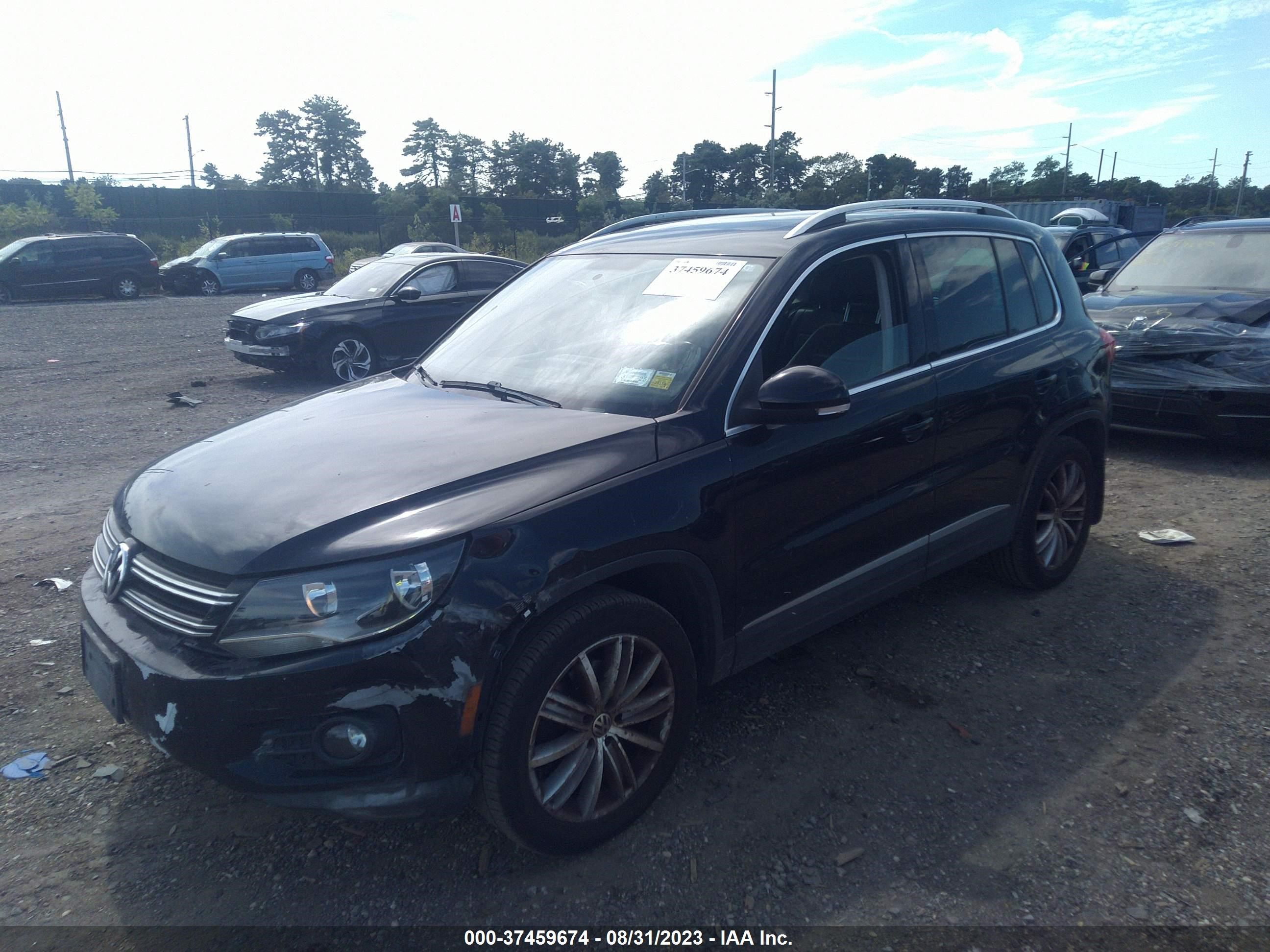 Photo 1 VIN: WVGBV3AX8DW584511 - VOLKSWAGEN TIGUAN 