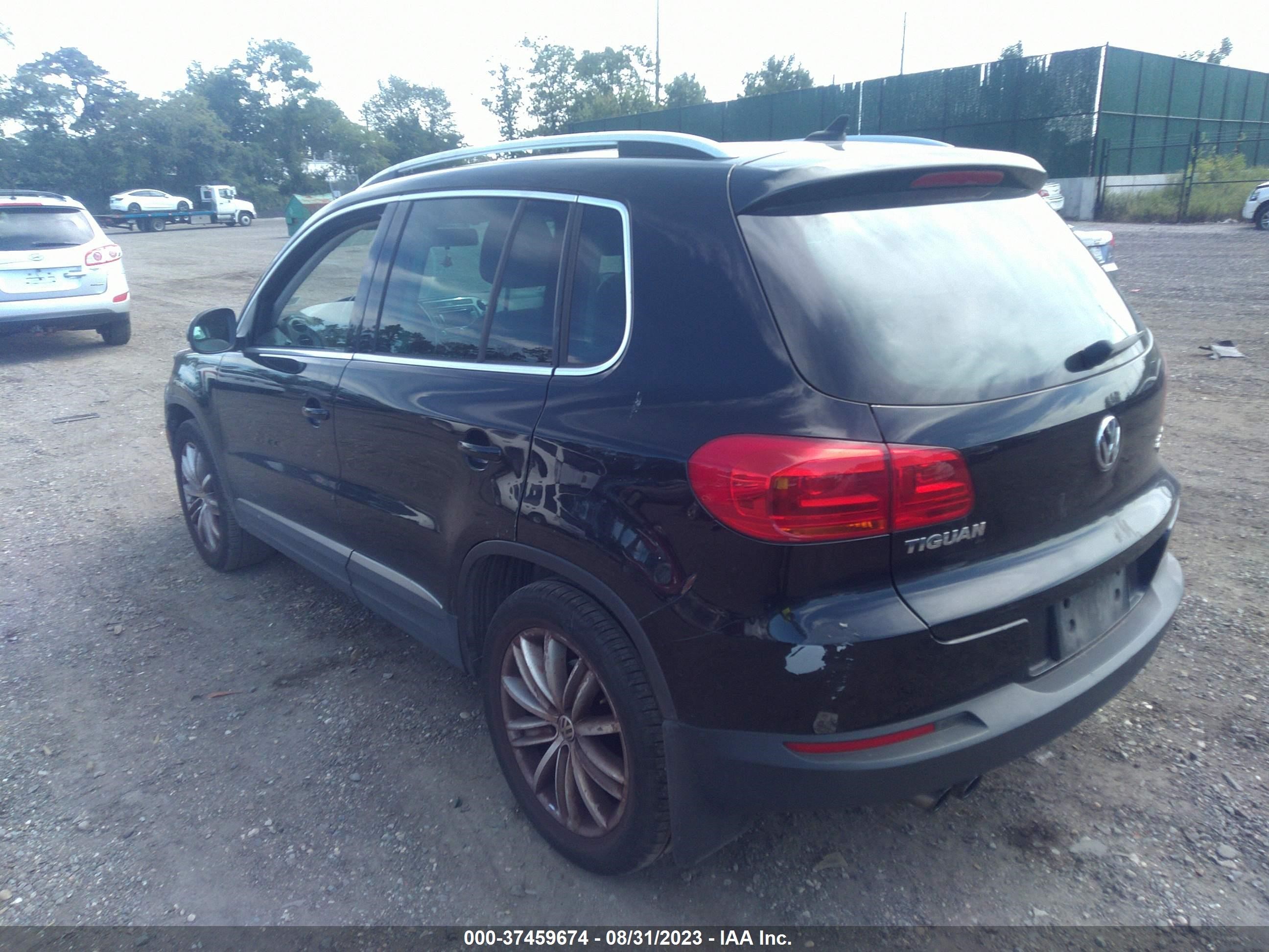 Photo 2 VIN: WVGBV3AX8DW584511 - VOLKSWAGEN TIGUAN 