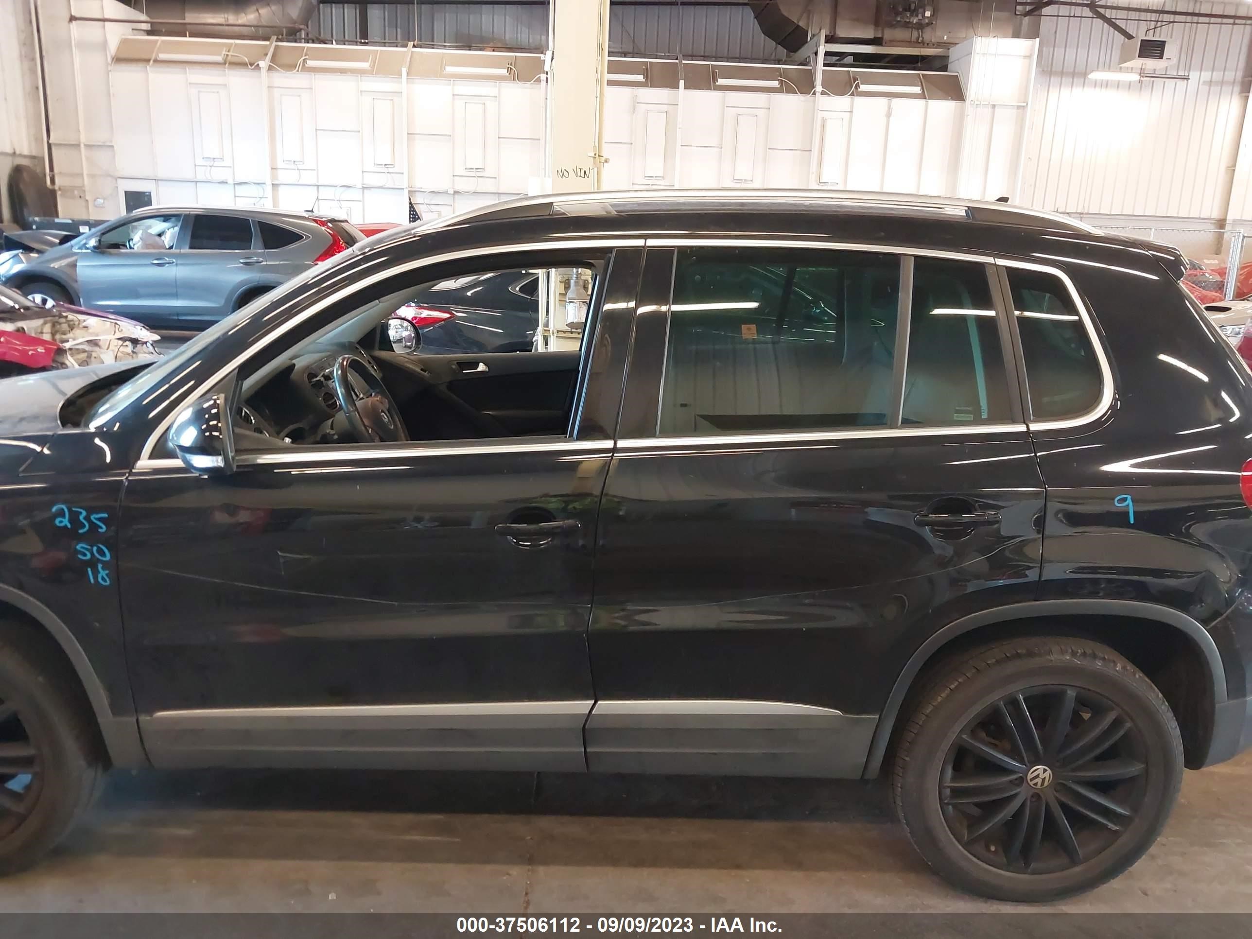 Photo 13 VIN: WVGBV3AX8EW559626 - VOLKSWAGEN TIGUAN 