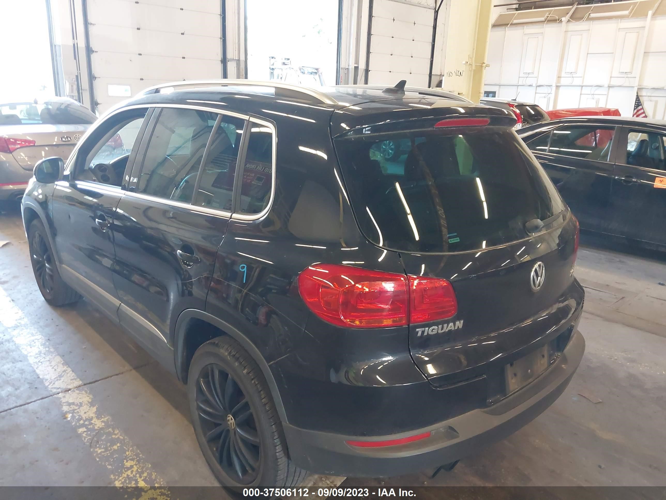 Photo 2 VIN: WVGBV3AX8EW559626 - VOLKSWAGEN TIGUAN 