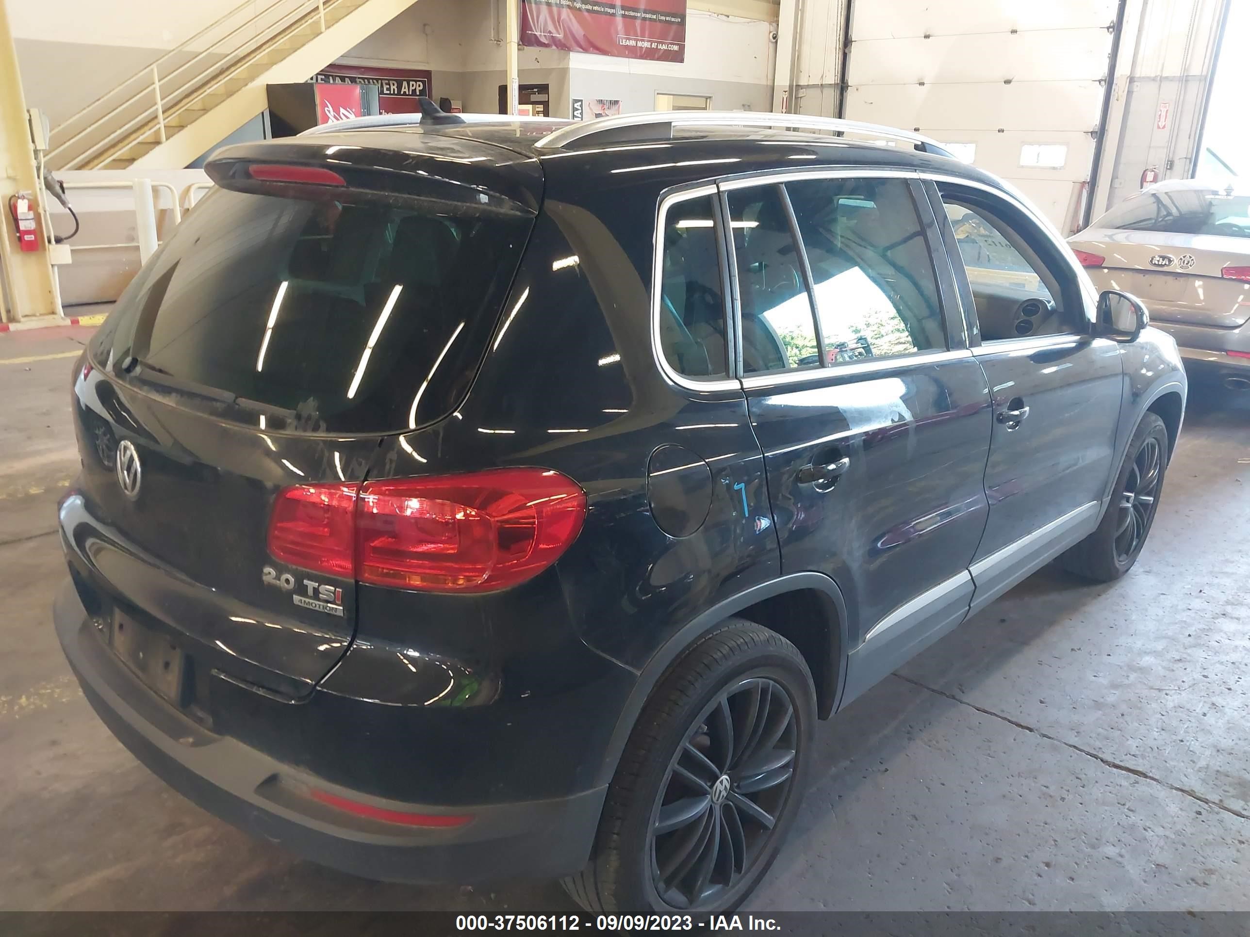 Photo 3 VIN: WVGBV3AX8EW559626 - VOLKSWAGEN TIGUAN 