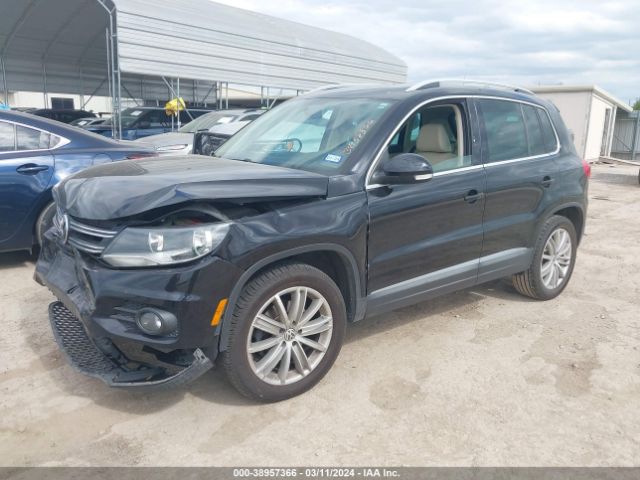 Photo 1 VIN: WVGBV3AX9EW557576 - VOLKSWAGEN TIGUAN 