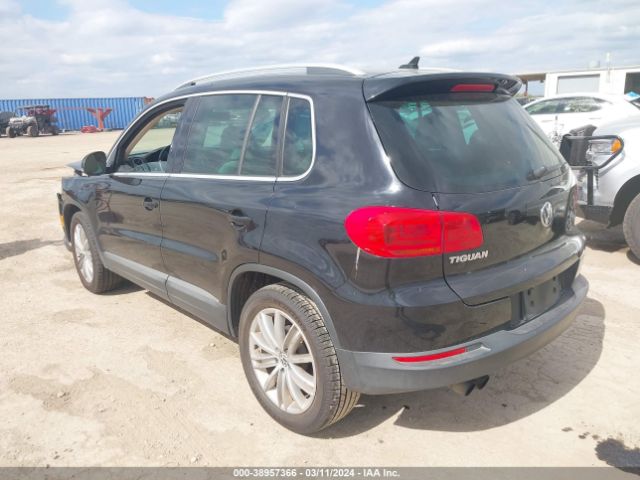 Photo 2 VIN: WVGBV3AX9EW557576 - VOLKSWAGEN TIGUAN 