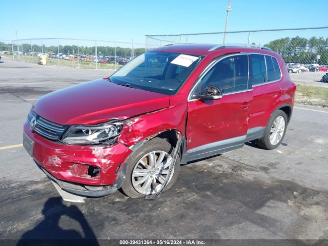 Photo 1 VIN: WVGBV3AXXEW079720 - VOLKSWAGEN TIGUAN 