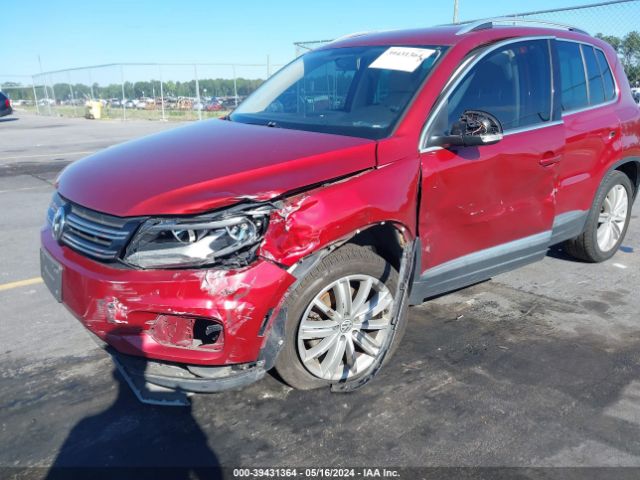 Photo 5 VIN: WVGBV3AXXEW079720 - VOLKSWAGEN TIGUAN 