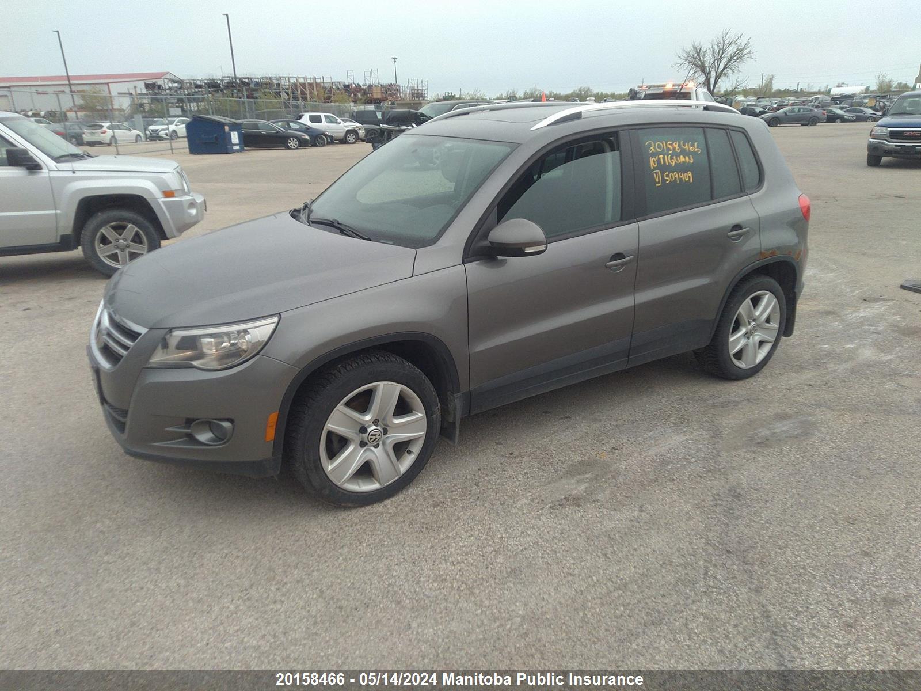 Photo 1 VIN: WVGBV7AX1AW509409 - VOLKSWAGEN TIGUAN 