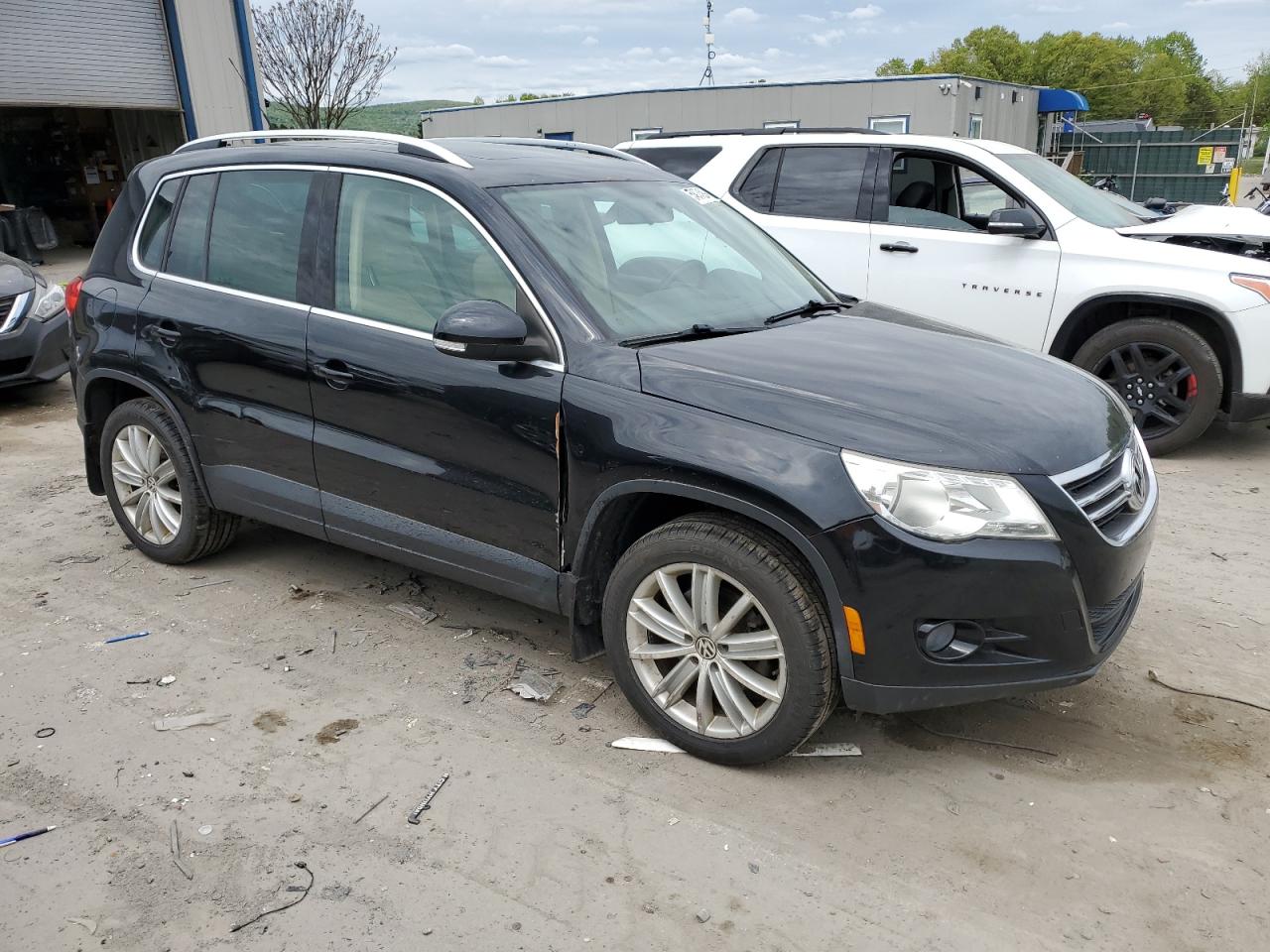 Photo 3 VIN: WVGBV7AX7BW553545 - VOLKSWAGEN TIGUAN 