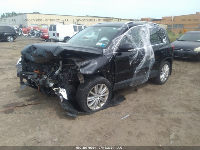 Photo 1 VIN: WVGBV7AX7BW565596 - VOLKSWAGEN TIGUAN 