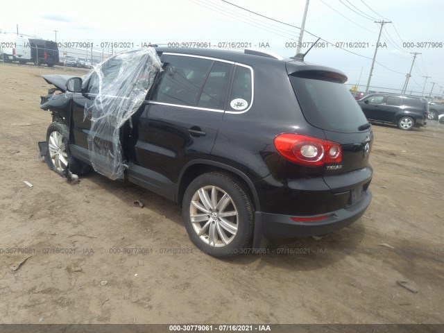 Photo 2 VIN: WVGBV7AX7BW565596 - VOLKSWAGEN TIGUAN 