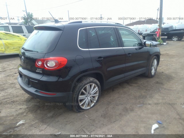 Photo 3 VIN: WVGBV7AX7BW565596 - VOLKSWAGEN TIGUAN 