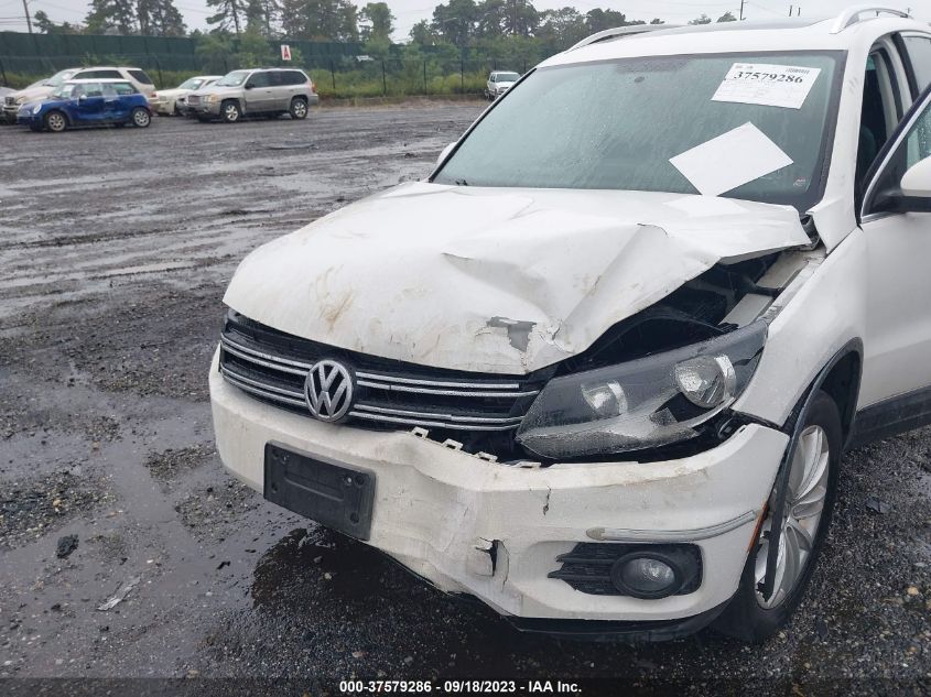 Photo 5 VIN: WVGBV7AX7CW510342 - VOLKSWAGEN TIGUAN 