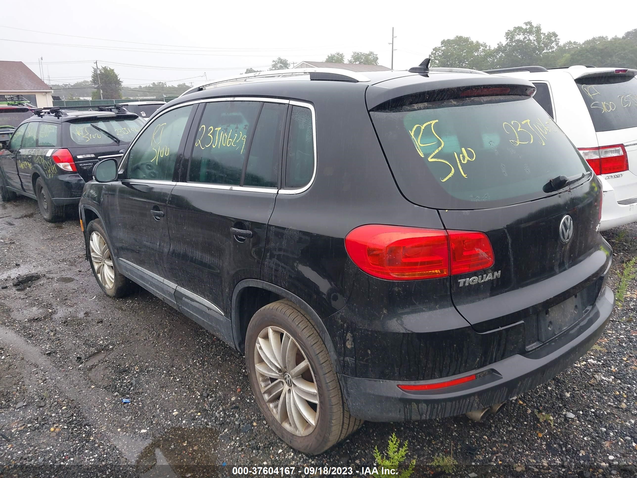 Photo 2 VIN: WVGBV7AX9CW543214 - VOLKSWAGEN TIGUAN 