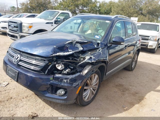 Photo 1 VIN: WVGBV7AX9CW559011 - VOLKSWAGEN TIGUAN 