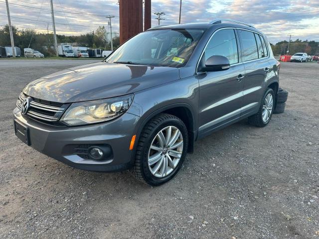 Photo 1 VIN: WVGBV7AX9GW594363 - VOLKSWAGEN TIGUAN 