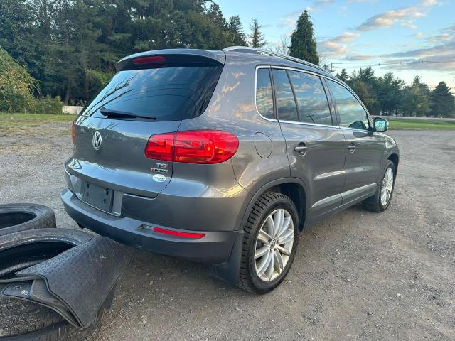 Photo 3 VIN: WVGBV7AX9GW594363 - VOLKSWAGEN TIGUAN 