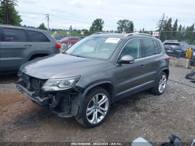 Photo 1 VIN: WVGBV7AXXCW005802 - VOLKSWAGEN TIGUAN 