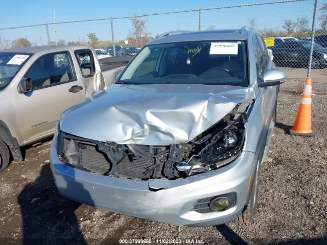 Photo 5 VIN: WVGBV7AXXDW557916 - VOLKSWAGEN TIGUAN 