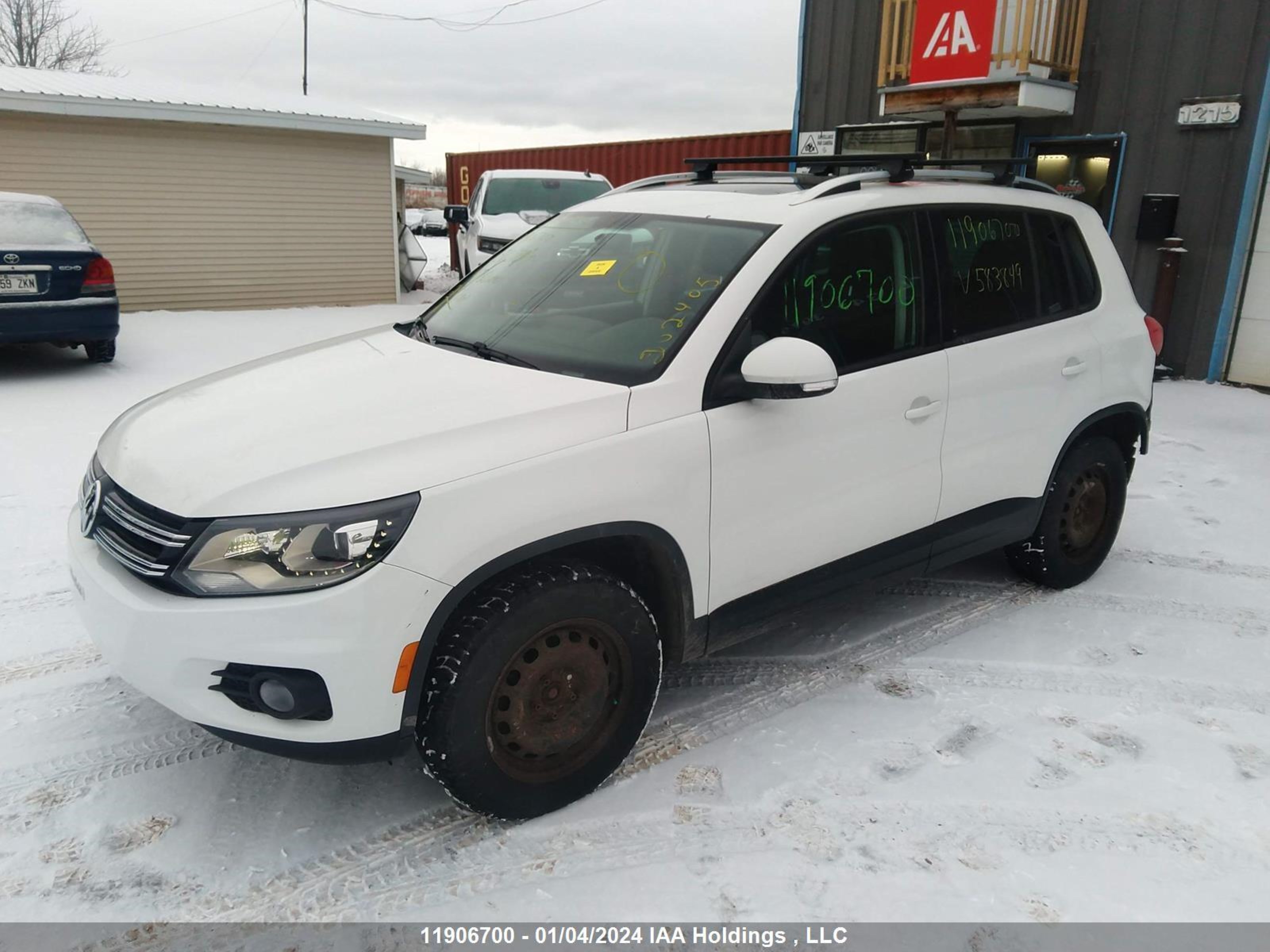 Photo 1 VIN: WVGJV3AX0EW583849 - VOLKSWAGEN TIGUAN 