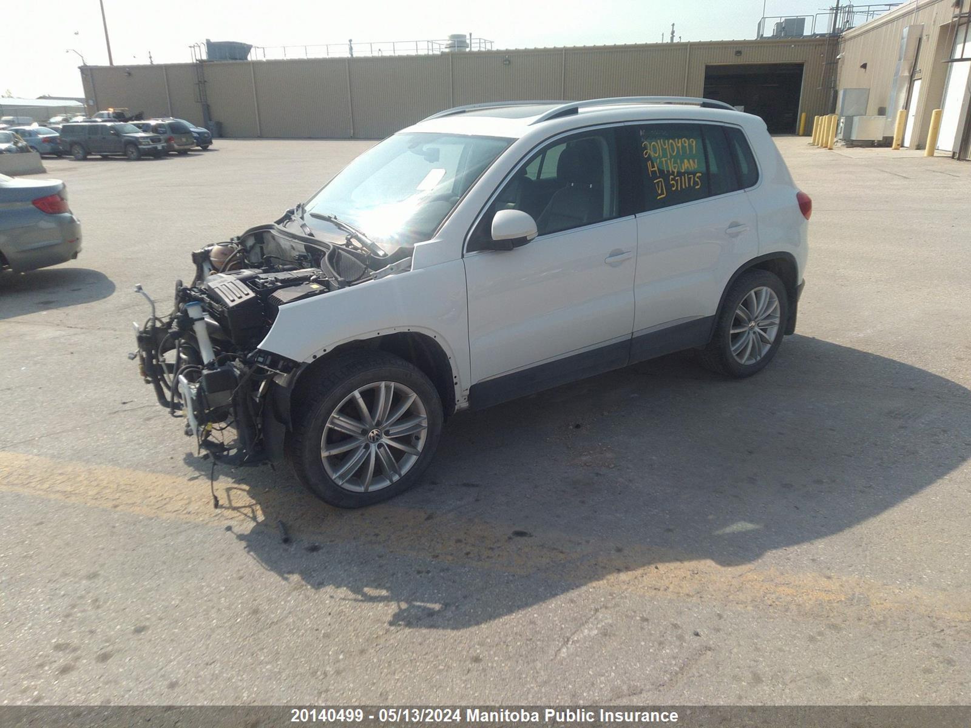 Photo 1 VIN: WVGJV3AX1EW571175 - VOLKSWAGEN TIGUAN 