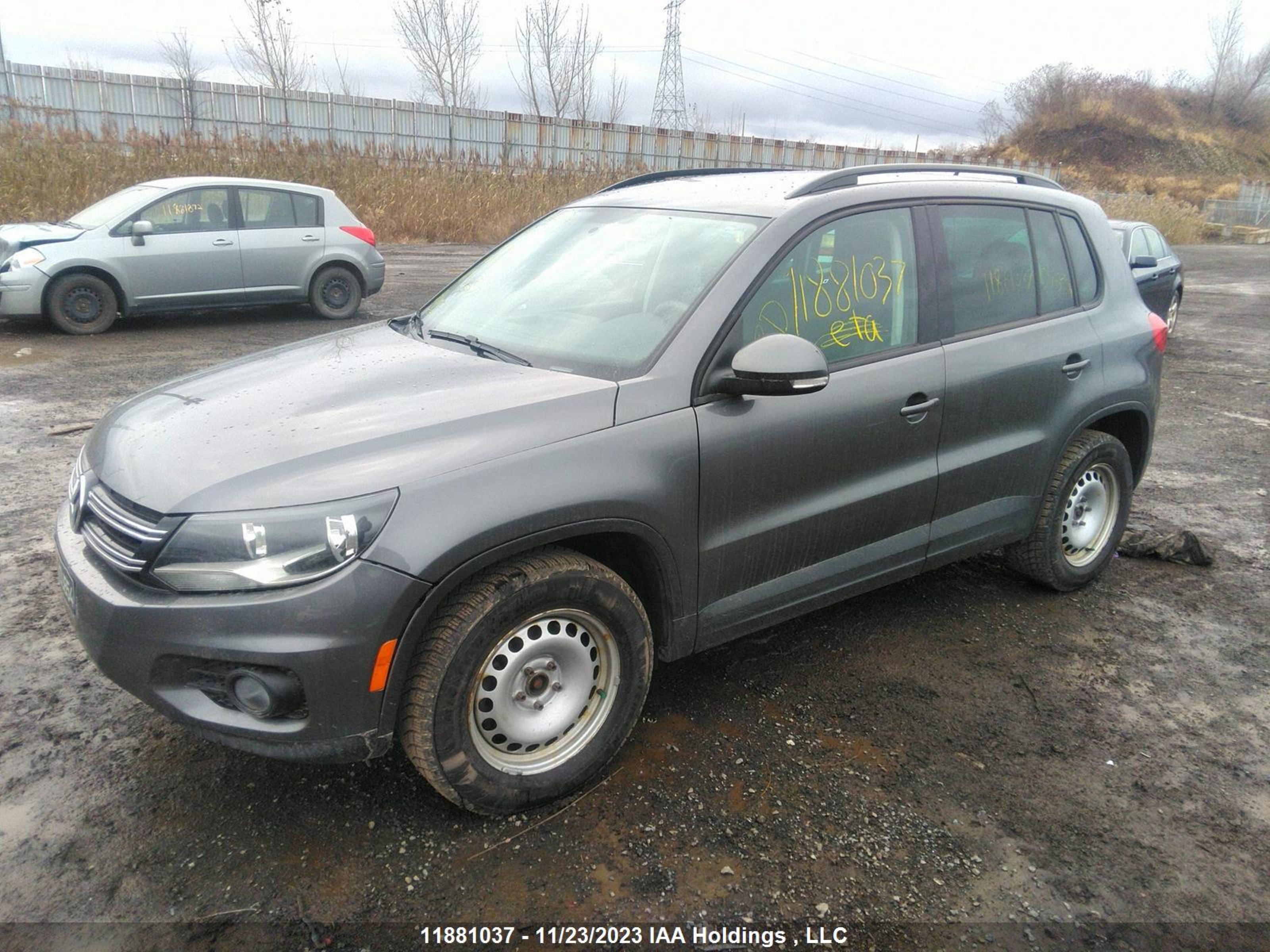 Photo 1 VIN: WVGJV3AX1EW595864 - VOLKSWAGEN TIGUAN 